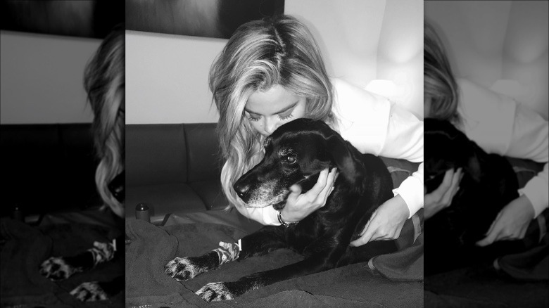 Khloe Kardashian kissing her dog Gabbana