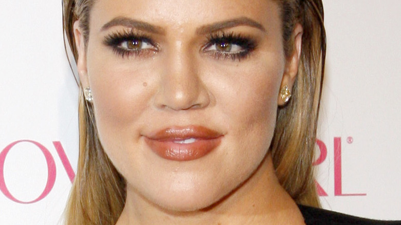 Khloe Kardashian smiling at event