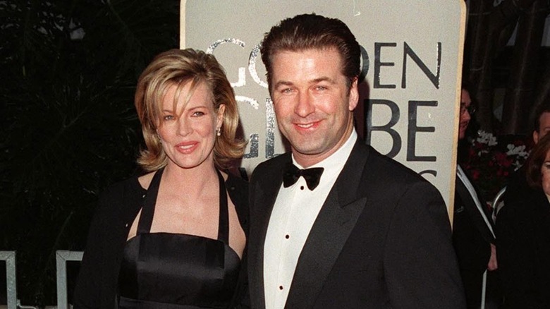 Kim Basinger and Alec Baldwin posing in 1998