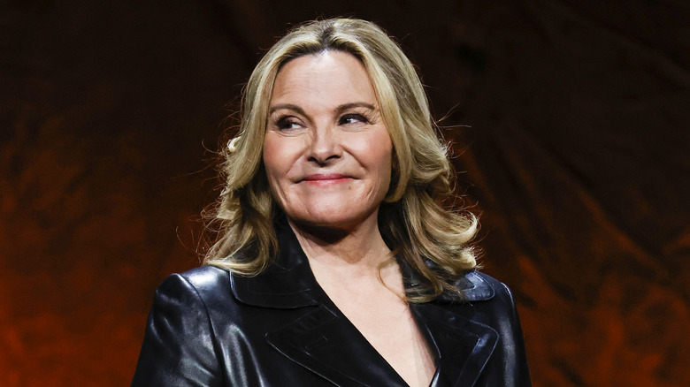 Kim Cattrall smiles on stage