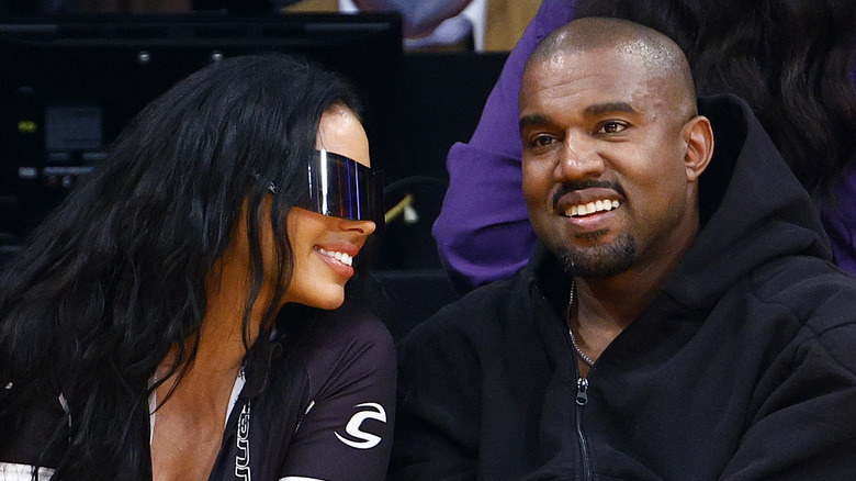 Kanye West and girlfriend Chaney Jones smiling