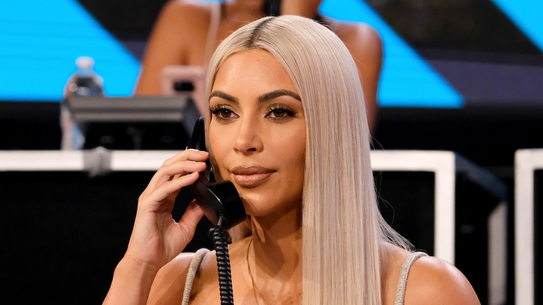 Kim Kardashian on phone