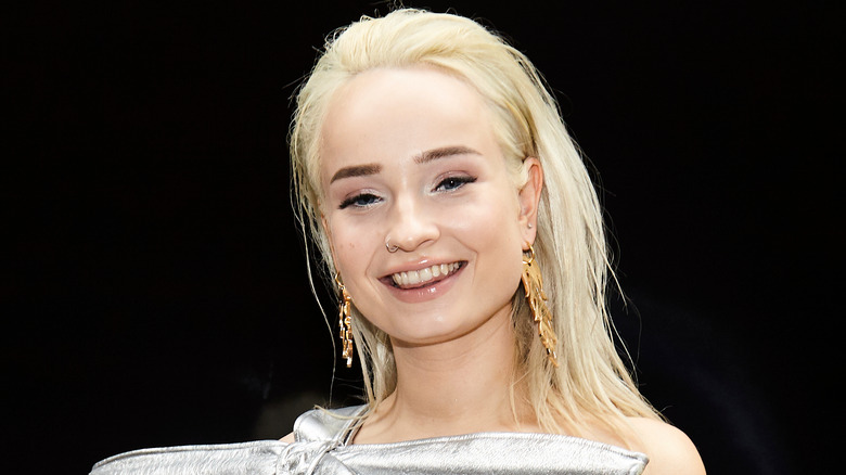 Kim Petras smiling