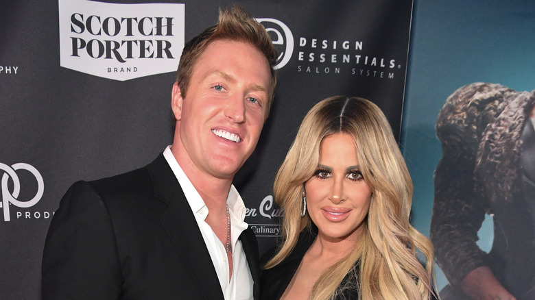 Kroy Biermann and Kim Zolciak posing