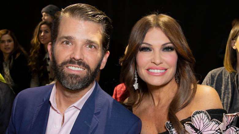 Donald Trump Jr., Kimberly Guilfoyle smiling