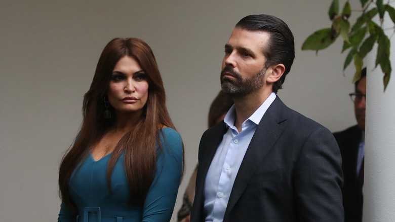 Kimberly Guilfoyle and Donald Trump Jr. serious