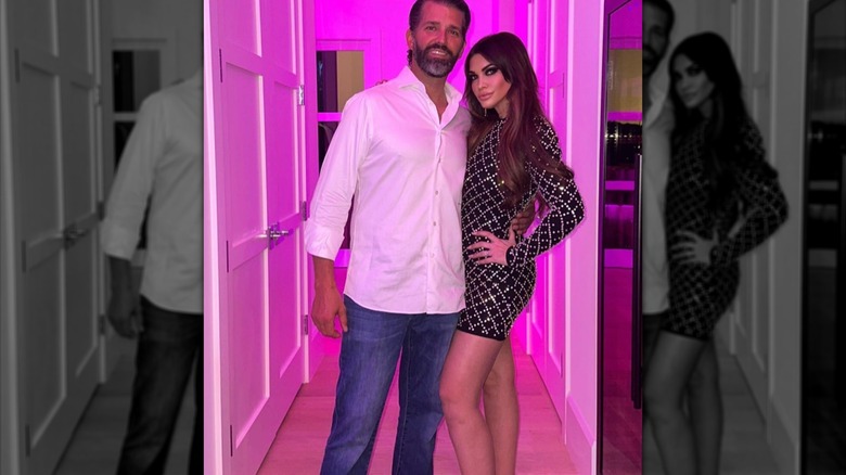 Donald Trump Jr. embracing Kimberly Guilfoyle