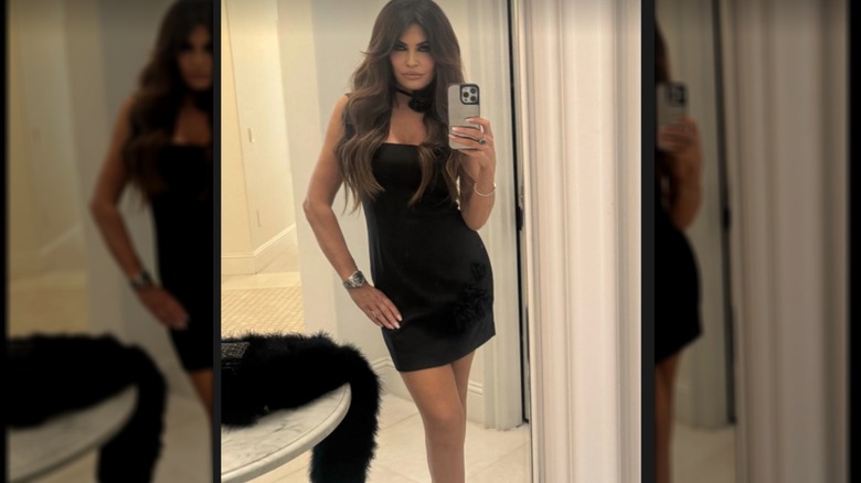 Kimberly Guilfoyle mirror selfie in black dress