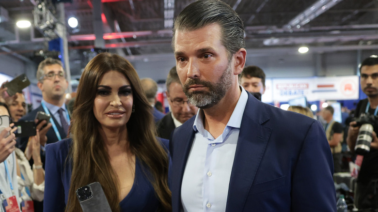 Kimberly Guilfoyle and Donald Trump Jr. walking