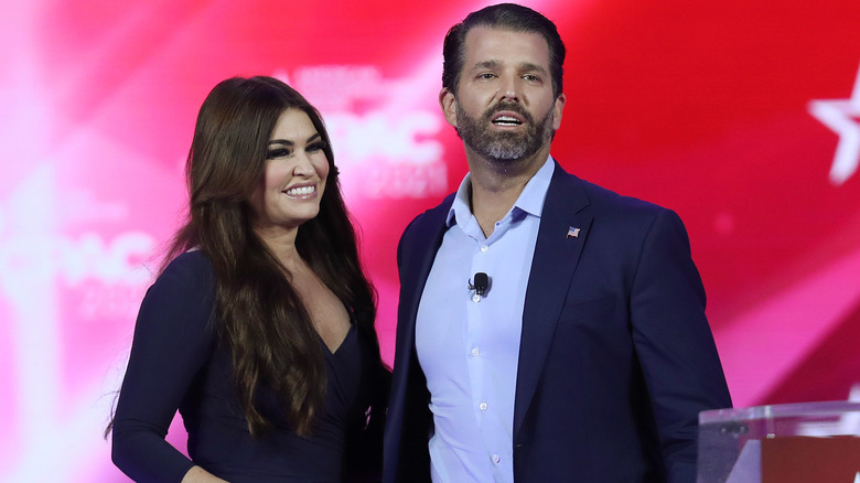 Kimberly Guilfoyle and Donald Trump Jr. smiling