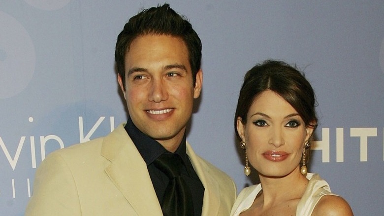 Eric Villency and Kimberly Guilfoyle posing at event