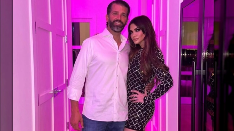 Donald Trump Jr. posing with Kimberly Guilfoyle