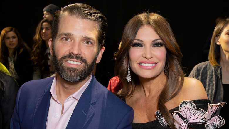 Donald Trump Jr. and Kimberly Guilfoyle smiling