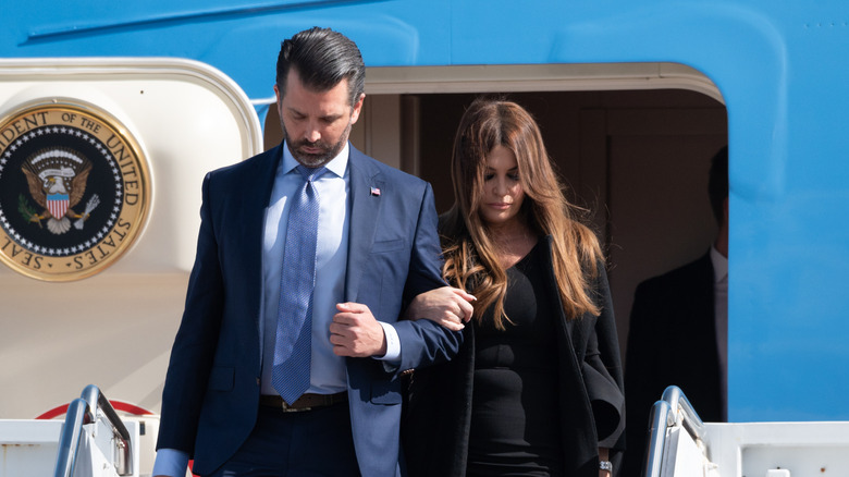 Donald Trump Jr. and Kimberly Guilfoyle exiting Air Force One in 2020