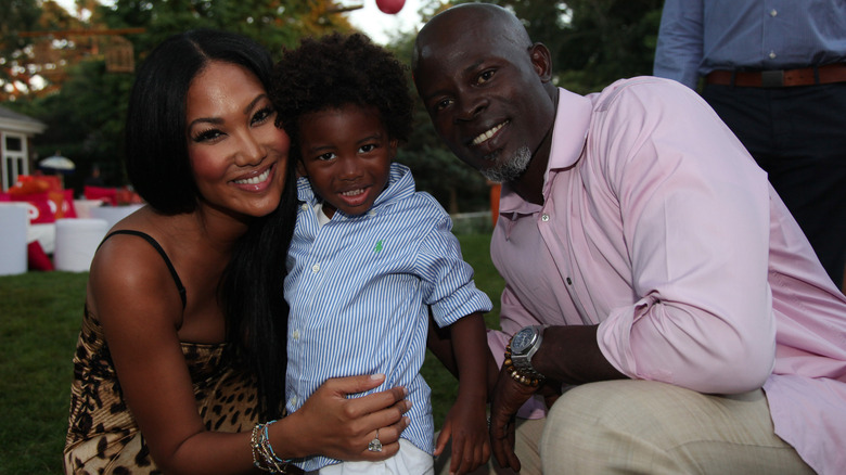 Kimora Lee Simmons, Kenzo Lee Hounsou and Djimon Hounsou smiling