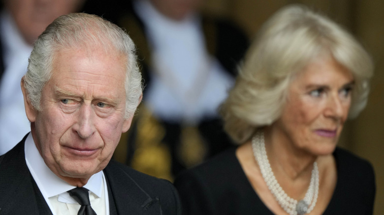 King Charles III side eye and Camilla, queen consort