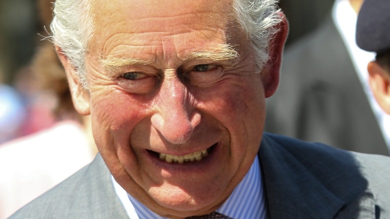 King Charles III smiling