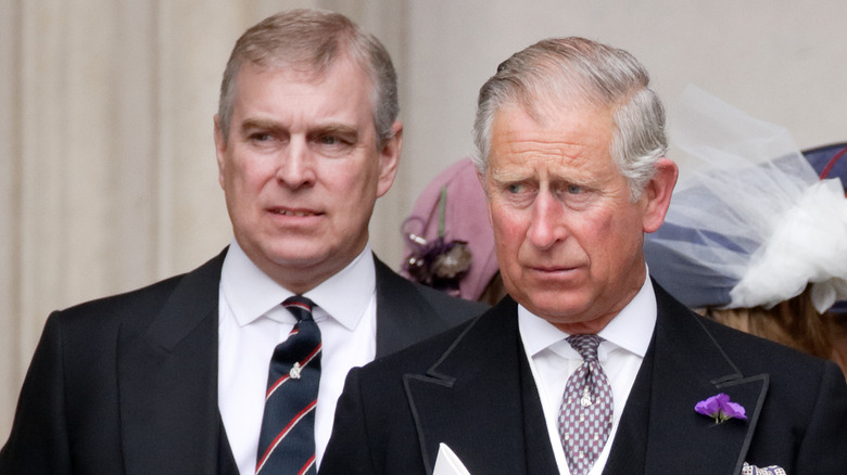 King Charles III and Prince Andrew in suits 