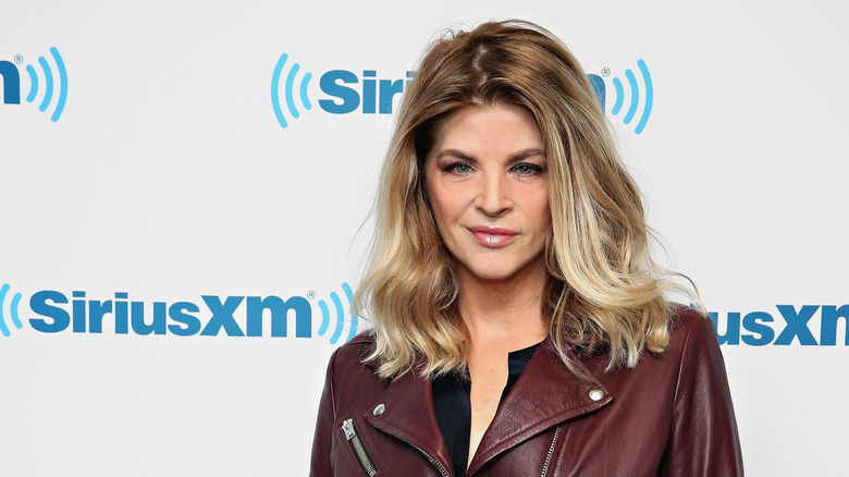 Kirstie Alley, smirking