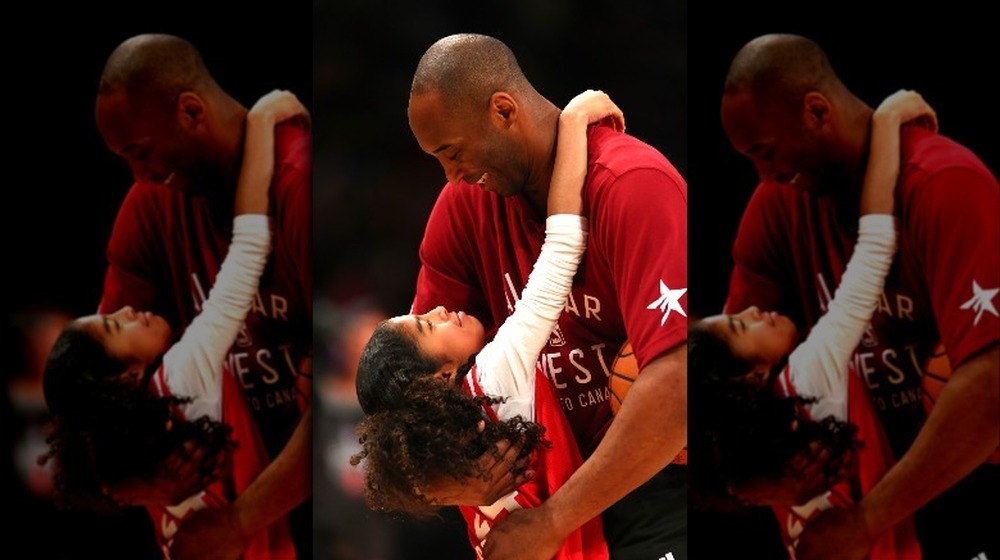 Kobe and Gianna Bryant at a basketball game