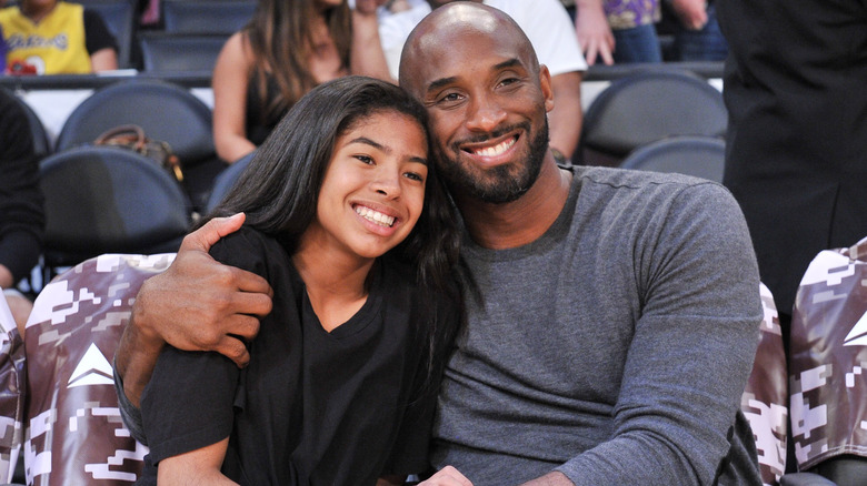 Kobe Bryant and Gianna Bryant at a basketball game