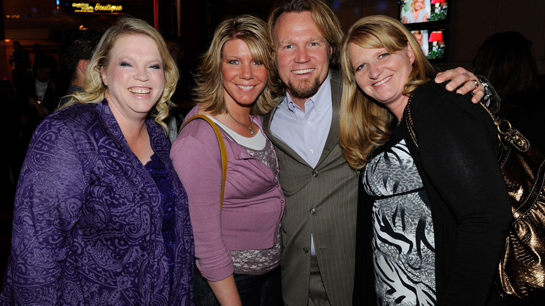 Kody Brown and wives pose at an event