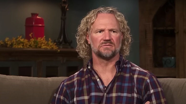 Kody Brown sitting on a sofa during Sister Wives confessional