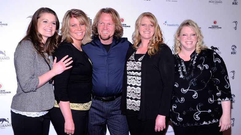 Robyn Brown, Meri Brown, Kody Brown, Christine Brown, and Janelle Brown on a red carpet