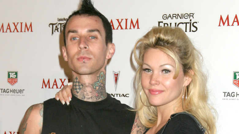 Shanna Moakler and Travis Barker pose on red carpet