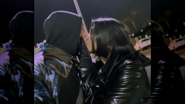 Travis Barker and Kourtney Kardashian kissing