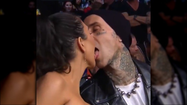 Kourtney Kardashian and Travis Barker kissing