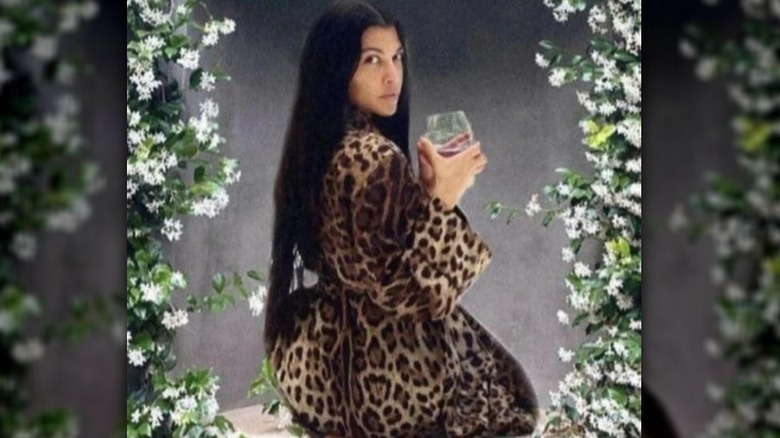 Kourtney Kardashian posing