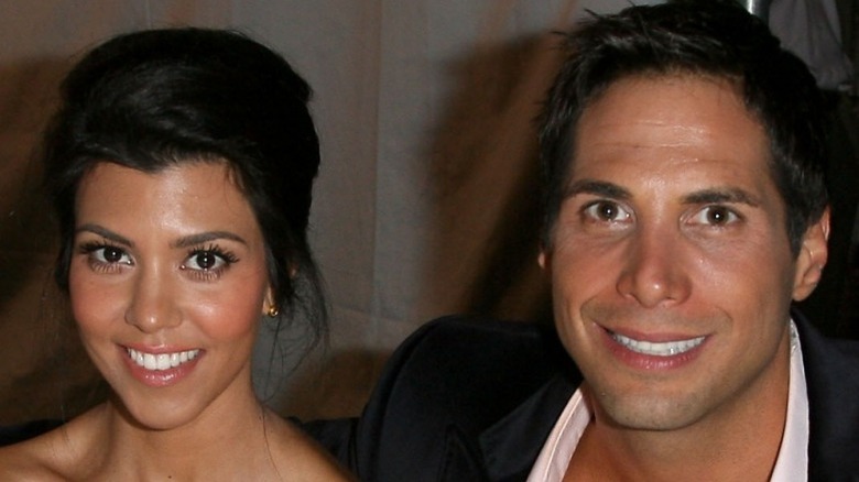 Kourtney Kardashian Joe Francis smiling 