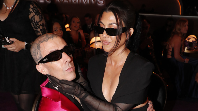 Travis Barker and Kourtney Kardashian attending the 64th Annual GRAMMY Awards