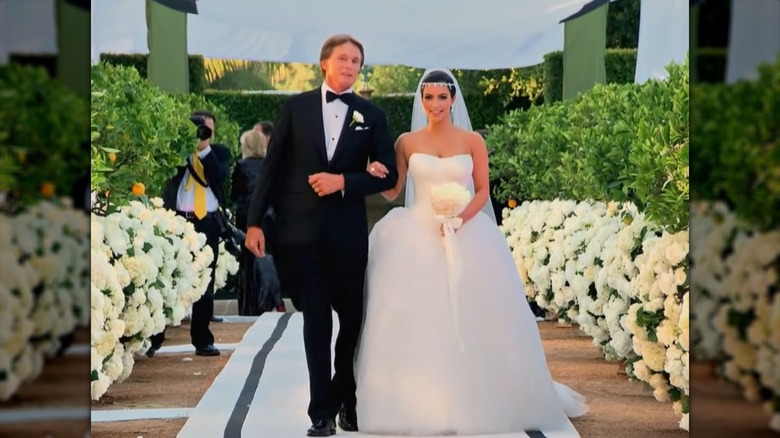 Caitlyn Jenner and Kim Kardashian walking down aisle