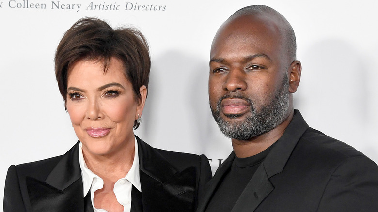 Kris Jenner, Corey Gamble posing