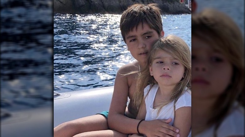 Mason and Reign on a boat.