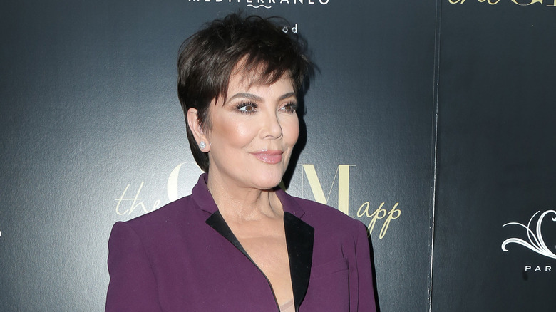 Kris Jenner poses Cleo awards 