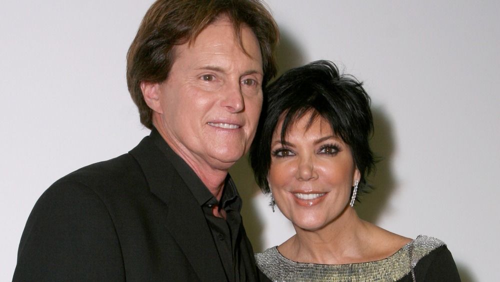 Kris Jenner and Caitlyn Jenner posing together at an event