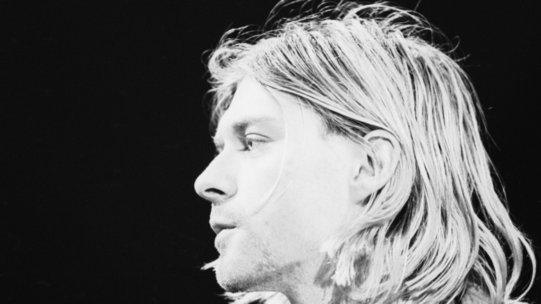 Kurt Cobain looking to the side in black and white photo