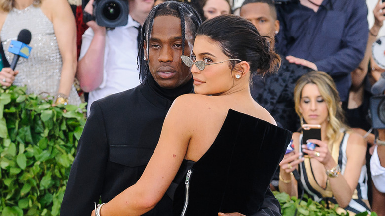 Travis Scott and Kylie Jenner pose 