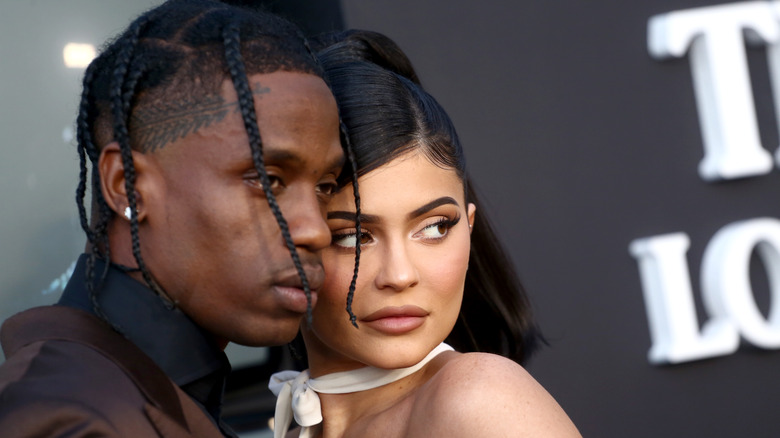 Travis Scott and Kylie Jenner posing