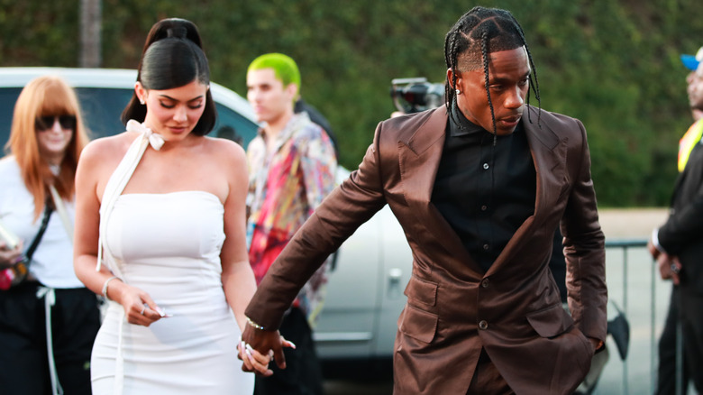 Kylie Jenner and Travis Scott walking