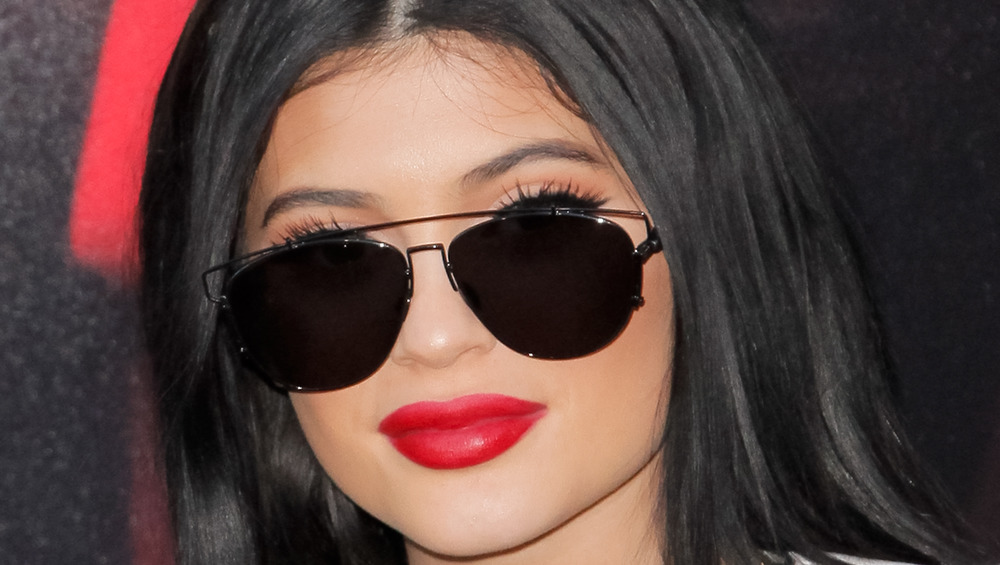 Kylie Jenner shows off her bright red pout