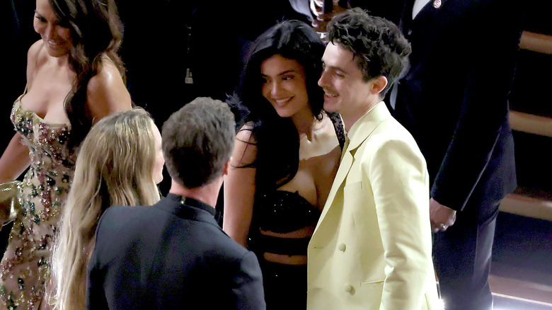 Kylie Jenner and Timothée Chalamet posing at the 2025 Oscars