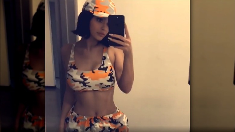 Kylie Jenner wearing camouflage print