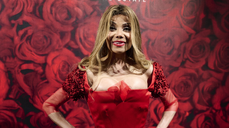 La Toya Jackson wearing a red dress