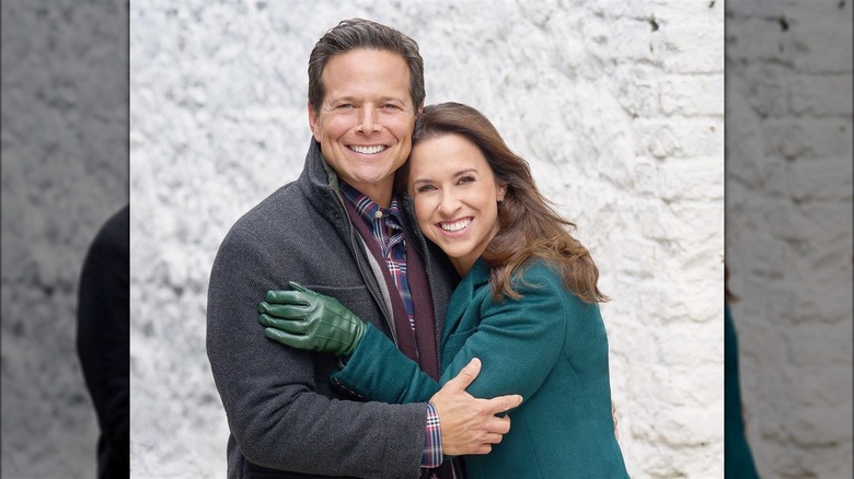 Scott Wolf and Lacey Chabert hugging