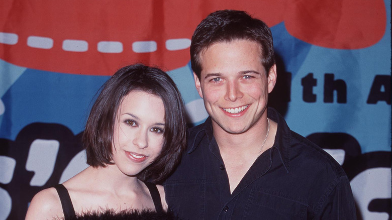 Lacey Chabert poses with Scott Wolf