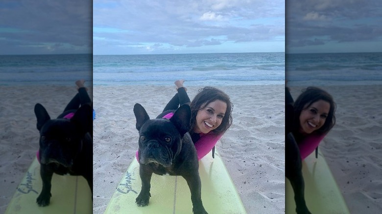 Lacey Chabert posing with a dog